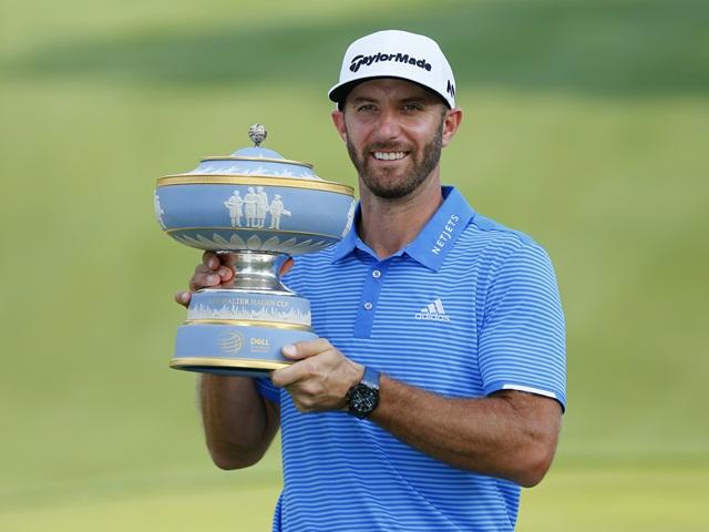 Dustin Johnson with the WGC Match Play Championship trophy 